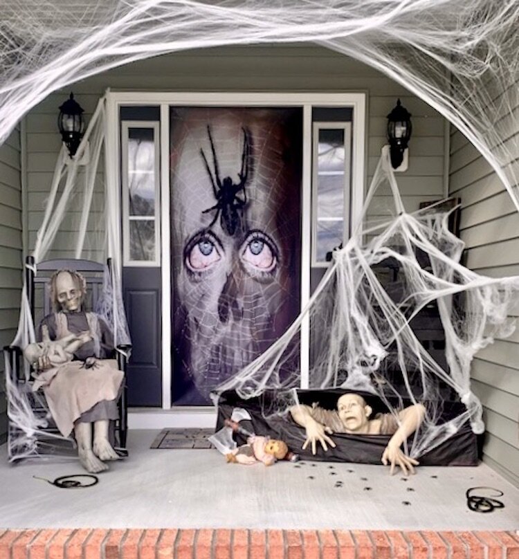 Halloween decorations centered on a Doorfoto creation.