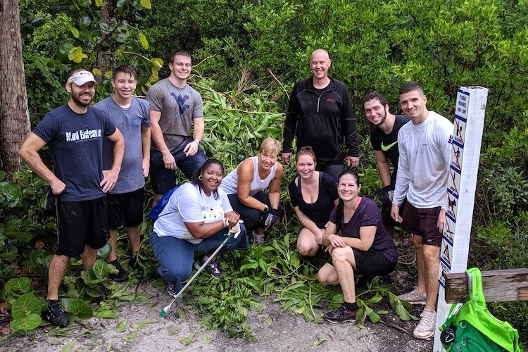 Estuary program volunteers work year-round to remove invasive plants and debris from their local waterways and restore natural habitats.