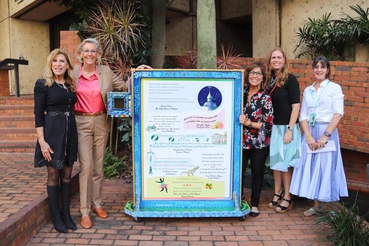 A moment during the Poetry Post’s debut with visual artist Eileen Goldenberg, Mayor Jane Castor, City of Tampa Wordsmith Gianna Russo, and Melissa Davies and Robin Nigh with the City of Tampa’s Arts & Cultural Affairs team.