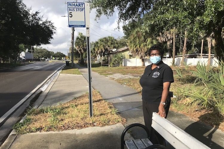 Jackson Heights Neighborhood Association President Fran Tate says bus stops like this one at 34th Street and 26th Avenue lack adequate shelter from the Florida sun and rain.