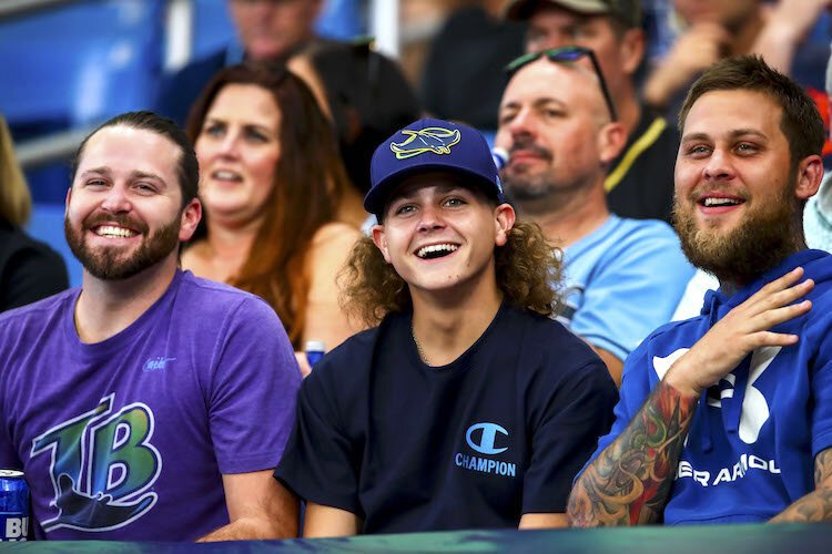 Rays fans cheer on their team against the Detroit Tigers in March 2021.