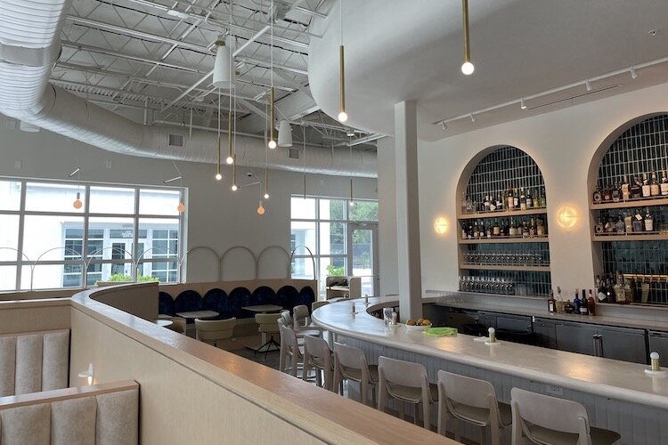 Cru Cellars wine bar opened a new location at Westshore Marina District.