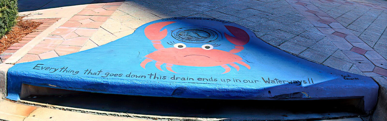 “Pollution makes me crabby” by Channel 8 News anchor Cyndi Edwards is part of Clearwater's storm drain mural series meant to increase awareness that litter originates on land and ends up in our waterways.