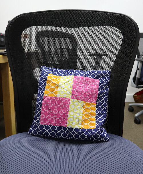 A finished throw pillow.