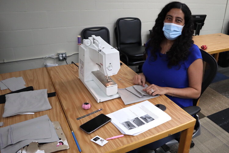 Hackerspace has home sewing machines, which have lots of decorative stitches, plus an industrial machine, a couple of sergers, and an embroidery machine.