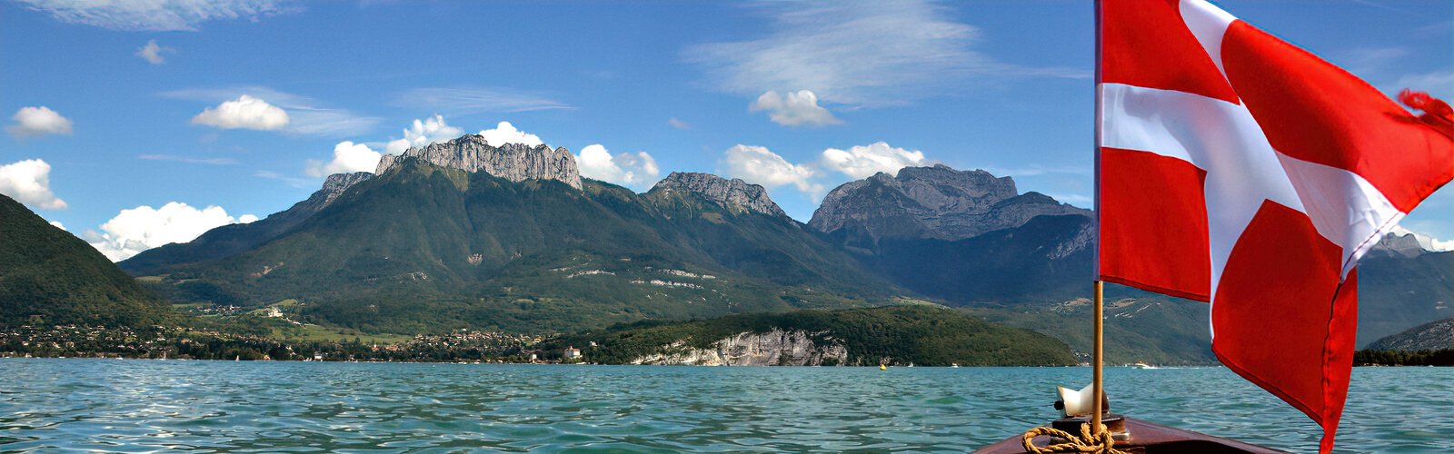 The Alpine region of Savoy in France (flag of Savoy) is the birthplace of the 63 bells forming the Ars Sonora Carillon. Since its creation in 1796 near Lake Annecy, the Paccard Bell Foundry has produced more than 120,000 bells.