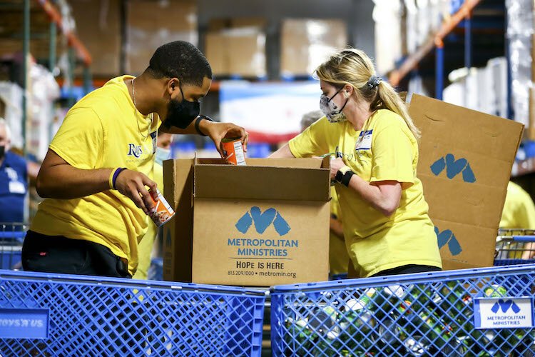 Tampa Bay Rays ECOT members build “Boxes of Hope” at Metropolitan Ministries for Rays Week of Giving in Tampa, FL, on December 7, 2021.