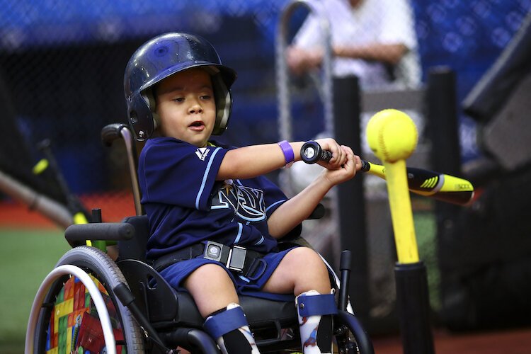 The Rays host children and families during regular baseball clinics. This image is from an event in 2019 at Tropicana Field. 
