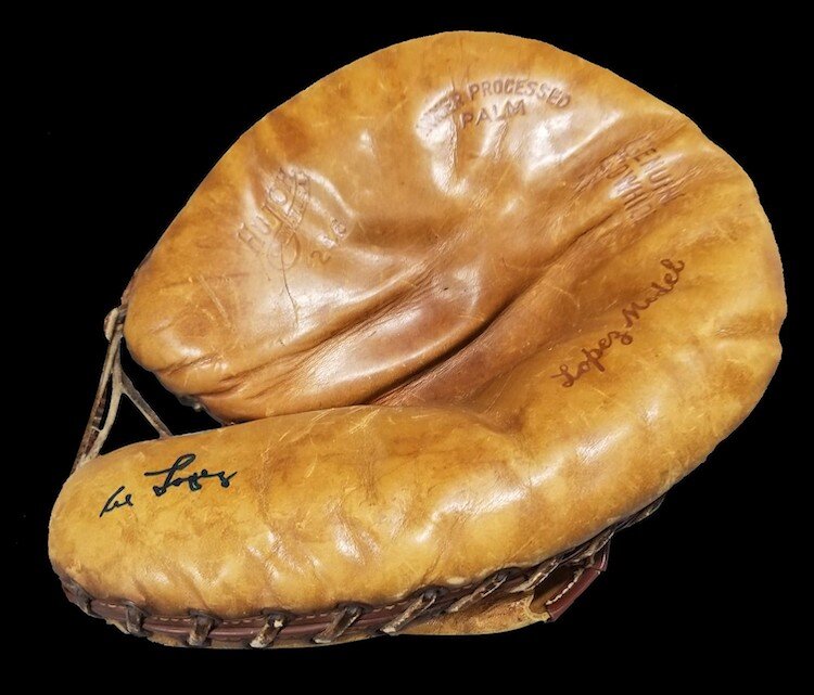 A catcher's mitt signed by Al Lopez.