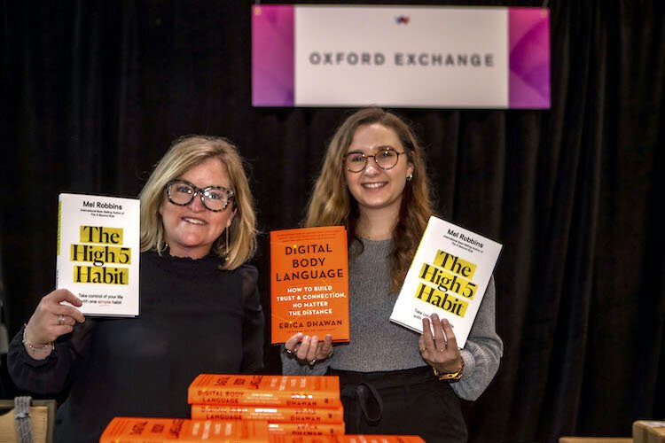 Oxford Exchange associates Laura Taylor and Kassie Weeks sold copies of keynote speakers Mel Robbins and Erica Dhawn's books.
