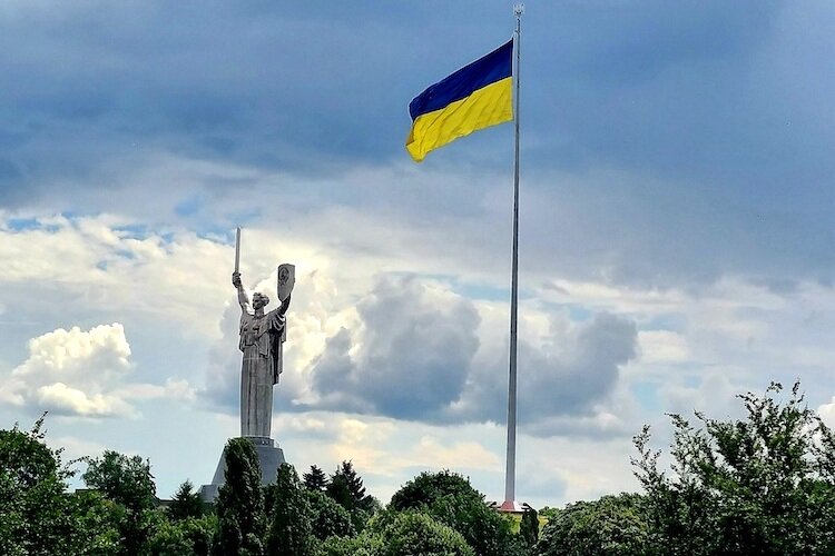 The Ukrainian flag flies in Kyiv in the summer of 2021.
