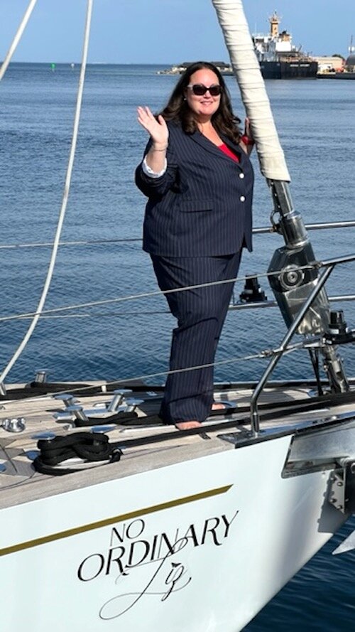 Liz Sutherland of I CAN Foundation aboard her favorite sailboat.