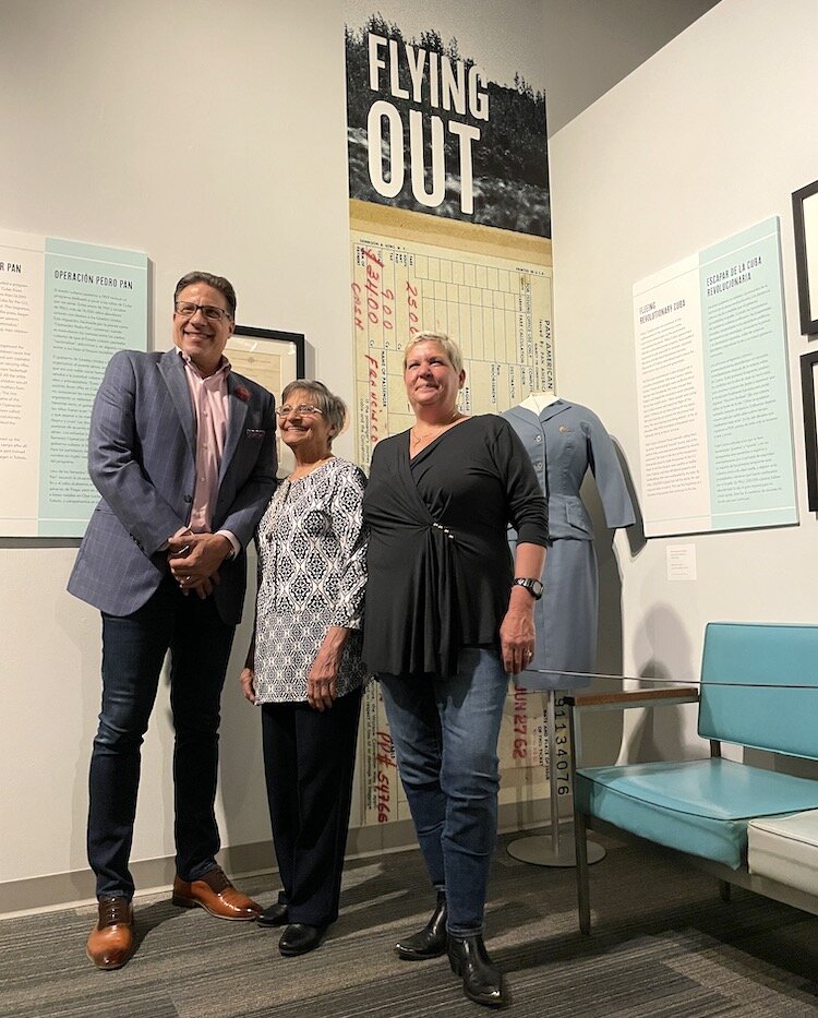 Jose Bello with his mom Angela and sister Ana visiting the Pathways to Cuba exhibit. Family patriarch, Angel Bello, has passed away.