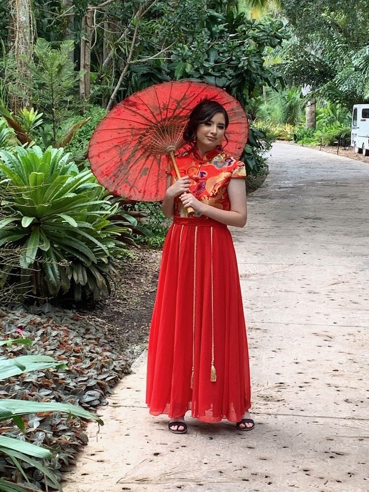 Sabrina, Lissette Campos' niece, honored her Canton roots with this traditional gown on her 15th birthday rather than wearing a more traditional Cuban dress.
