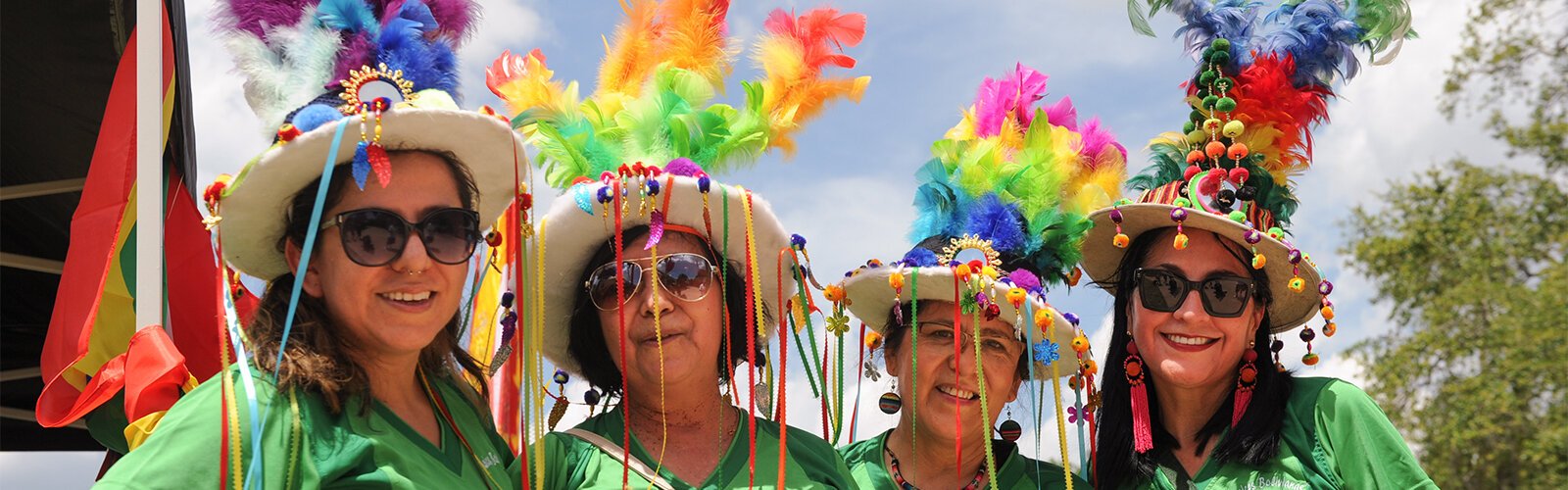 Paola Calvo, Patricia Florida, Janeth Florido and Frida Vazquez, aka Bolivian Roots, pose for a photo after their performance at the Multicultural Family Day in Tampa on May 1.