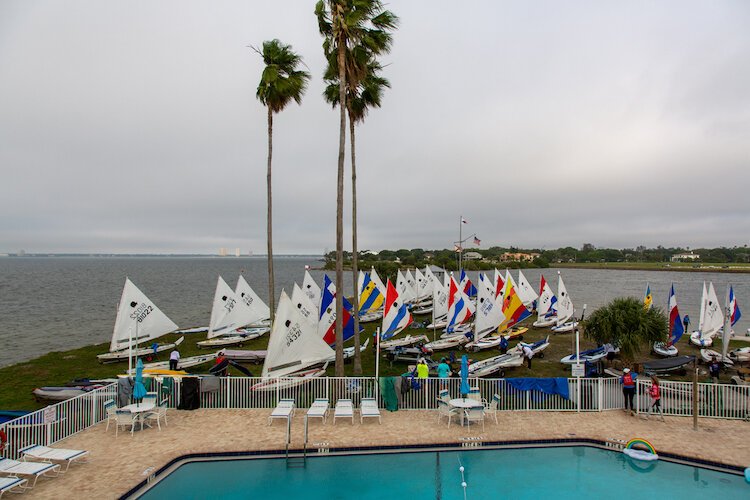 The first group of Sunfish boats gather for the start of a FWSA race at the Davis Island Yacht Club in Tampa.