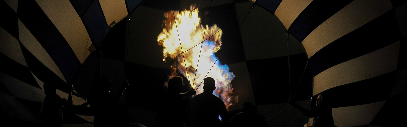 Flames shoot into a hot air balloon during the Riverfest Hot Air Balloon Glow in Curtis Hixon Park Saturday night.