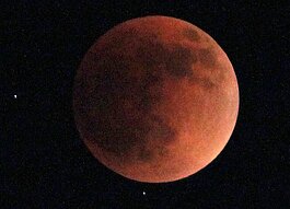 The total lunar eclipse Sunday evening created this rare and spectacular image of the glowing "blood moon."