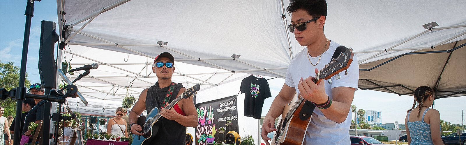 Bobby and Ty Vongvenekeo, father and son, make up “T & T” which provided music at The Market Marie on Saturday.