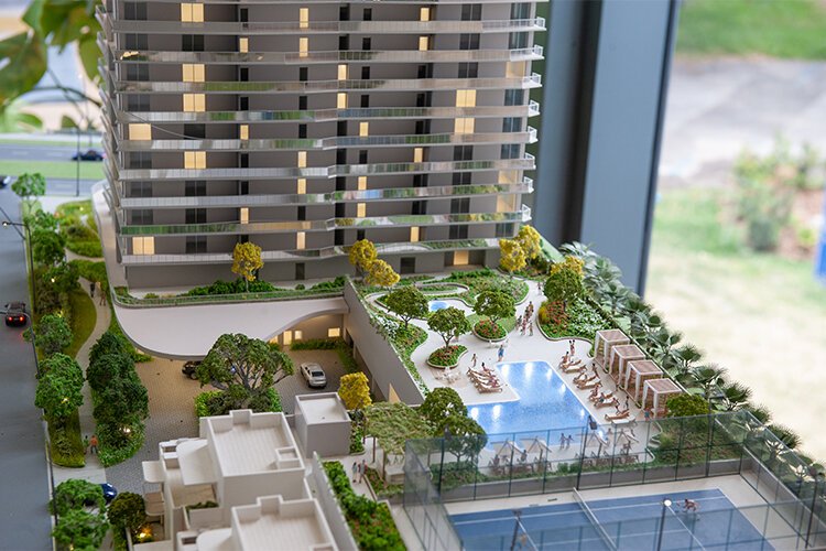 A view of a model showing what the  Residences by Ritz Carlton should look like at completion some time in 2024. This would be the west side with pool and tennis courts.