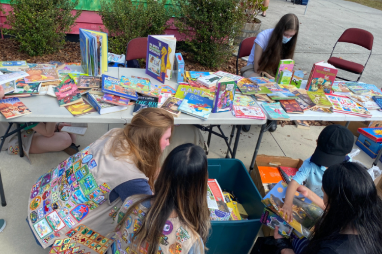 Elaine Feaster launched donation drives that have collected nearly 11,500 total books as As service projects for Troop 1247 of the Girl Scouts of West Central Florida.