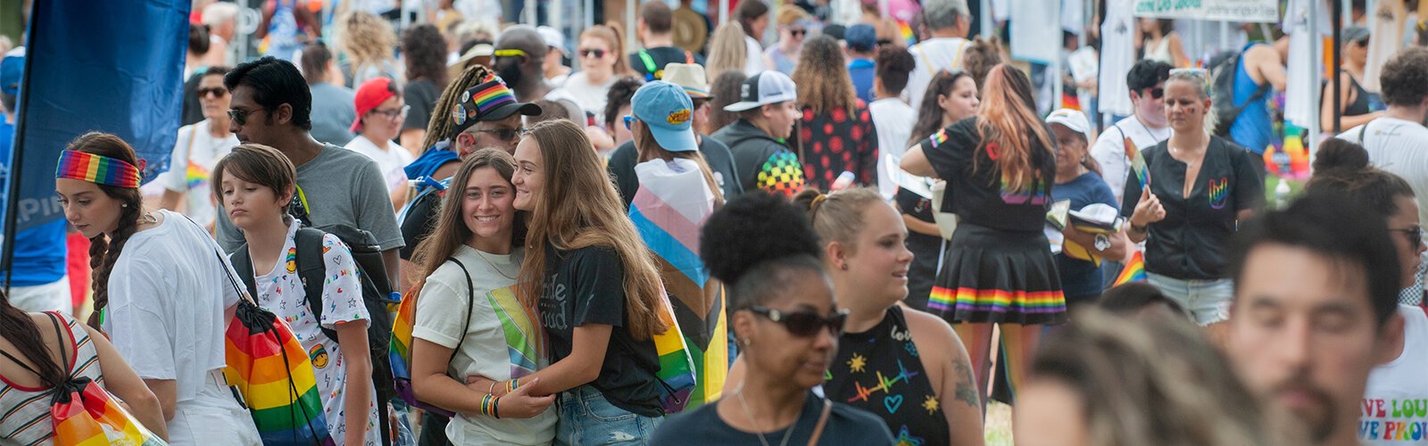  The crowds moved through the vendors as the start of the parade neared.