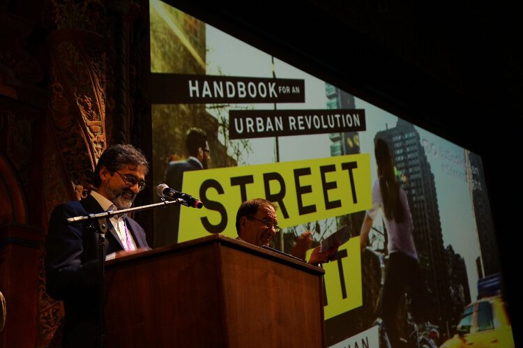 Tampa Mobility Director Vik Bhide and City Council Chair Joe Citro  give opening remarks before Janette Sadik-Khan's presentation at the Tampa Theatre.