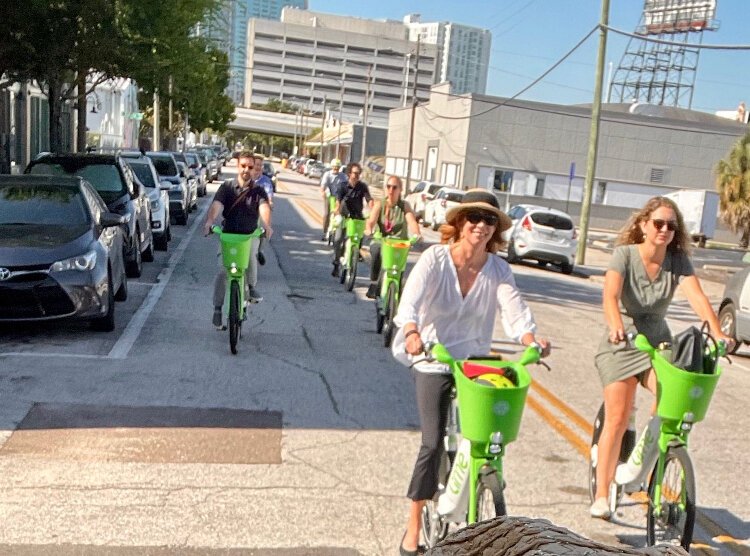 Janette Sadik Khan, the former transportation commissioner for New York City, and the team from Bloomberg Associates tour Tampa by e-bike on a recent visit. 
