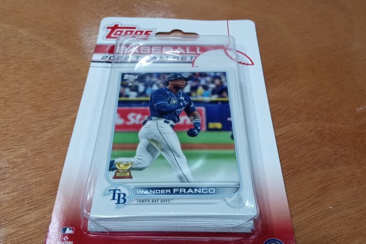 A Topps Tampa Bay Rays team set for 2022, with Wander Franco card on top.