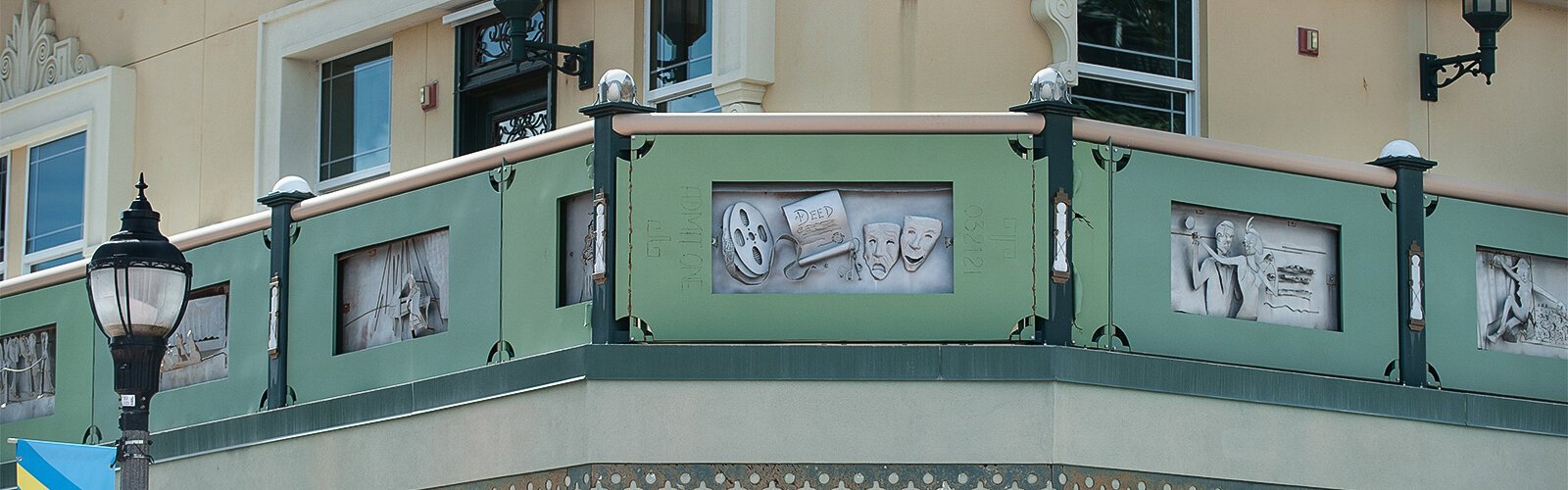 The stainless steel frieze “The Big Ticket” by artist Darin Evans on the exterior of the Capitol Theatre.