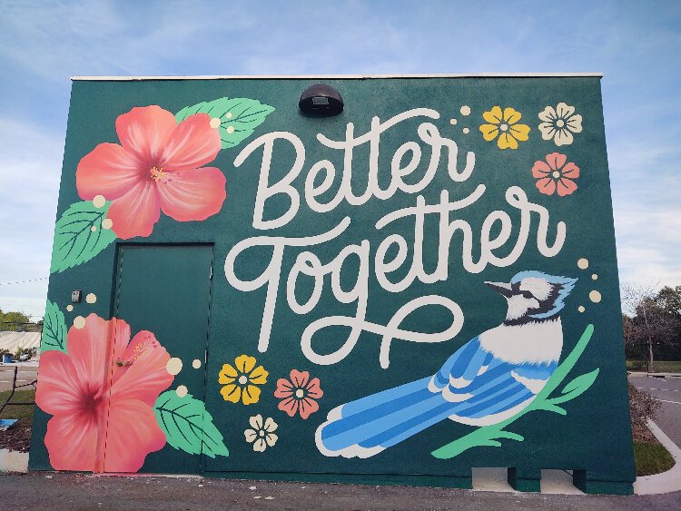 Local artist Leo Gomez's "Better Together" on the Lealman Exchange community center is part of a community pride and awareness mural project Creative Pinellas and the Lealman Community Redevelopment Agency have launched.