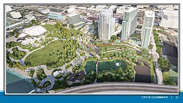 A rendering of The Bluffs mixed-use development adjacent to a redeveloped Coachman Park with covered amphitheater. 