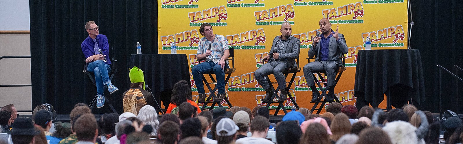Some stars from the hit series “Breaking Bad” were on-hand for a q&a session at the Tampa Bay Comic Con. On stage are a moderator and actors RJ Mitte and Daniel and Luis Moncada.