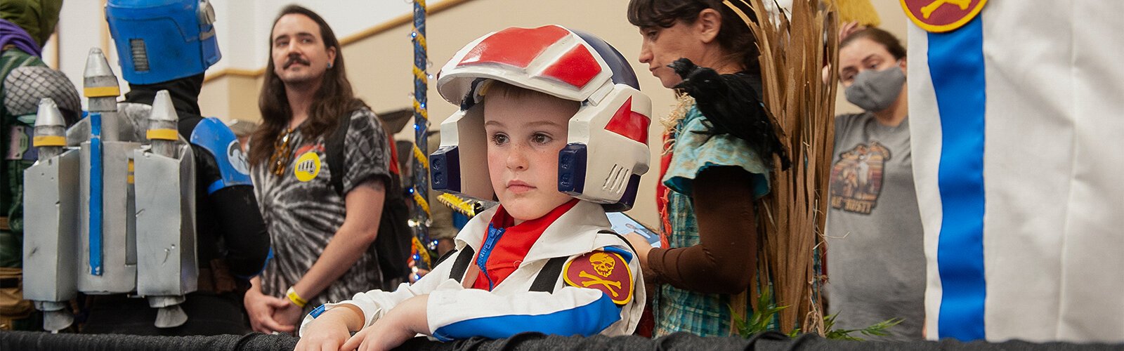 James Wannen, of Spring Hill, waits for the costume contest to begin. Wannen’s father said it was James’ idea to dress up, attend and take part in the contest.