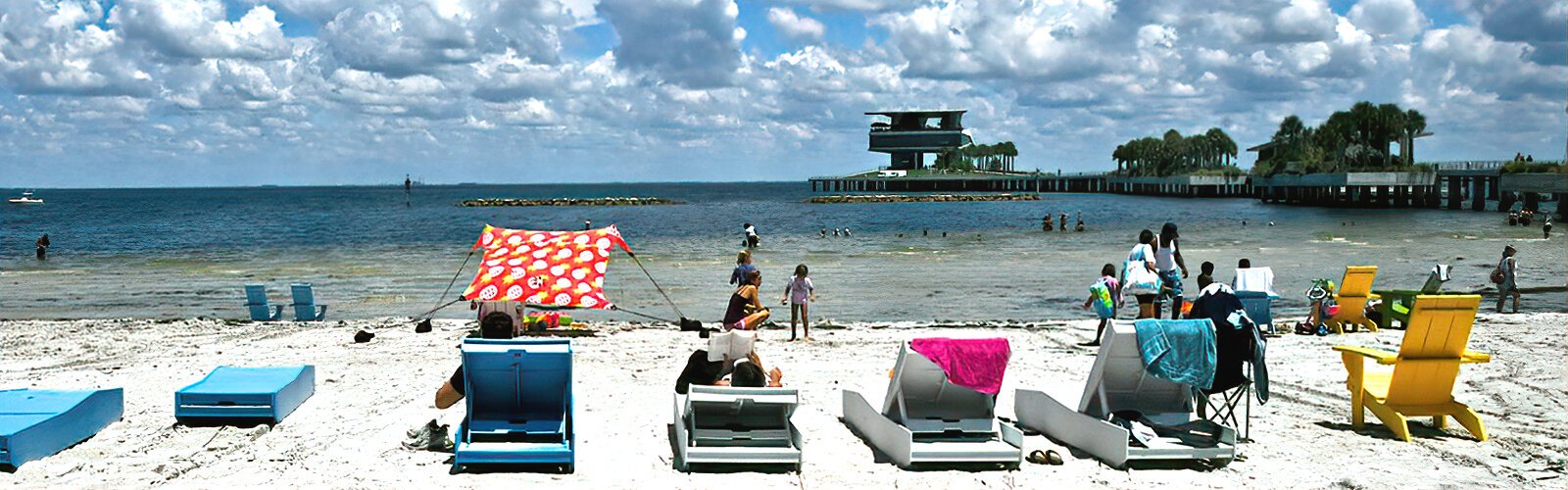 The inviting Spa Beach at the St Pete Pier is a true beach with warm silky sand and lounging chairs, right in downtown St Petersburg.