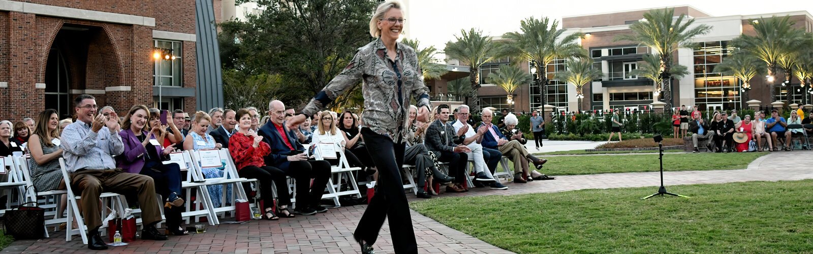 Mayor Jane Castor enthusiastically walks to the podium, pointing out that the University of Tampa is now home to the largest Ars Sonora in the world and thanking the Sykes for making it possible.