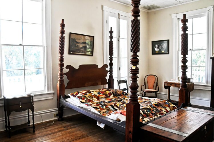 Raymond and Margaret Drier Robins’ bed in the second-floor bedroom is one of the few original pieces remaining in the house.