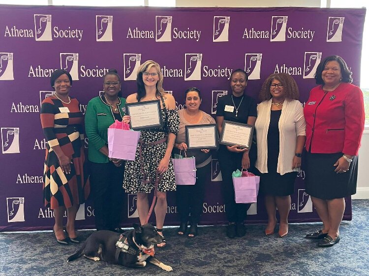 Athena Society 2022 Phyllis Marshall Career Assistance Grant winners Natalie Rychel, Crystal Doria and Annetta Hawkins pose with members of the group's leadership.