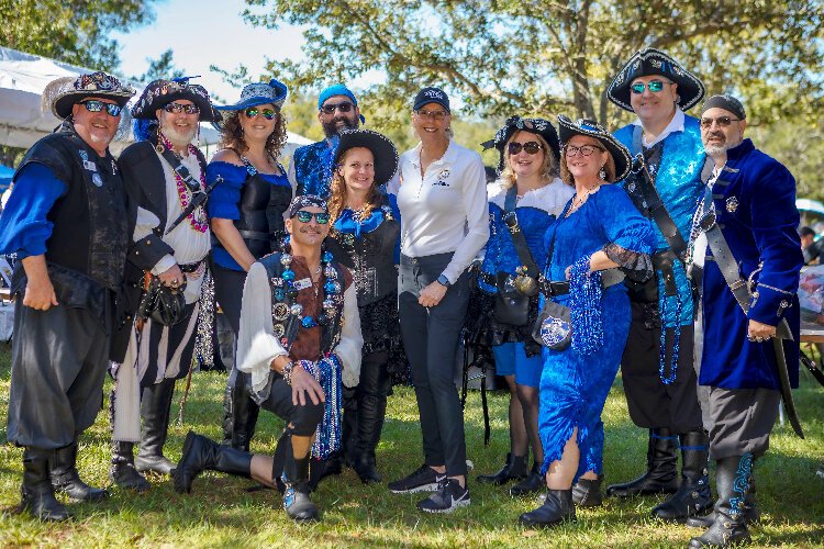 Tampa Mayor Jane Castor poses with a group at the Buddy Walk