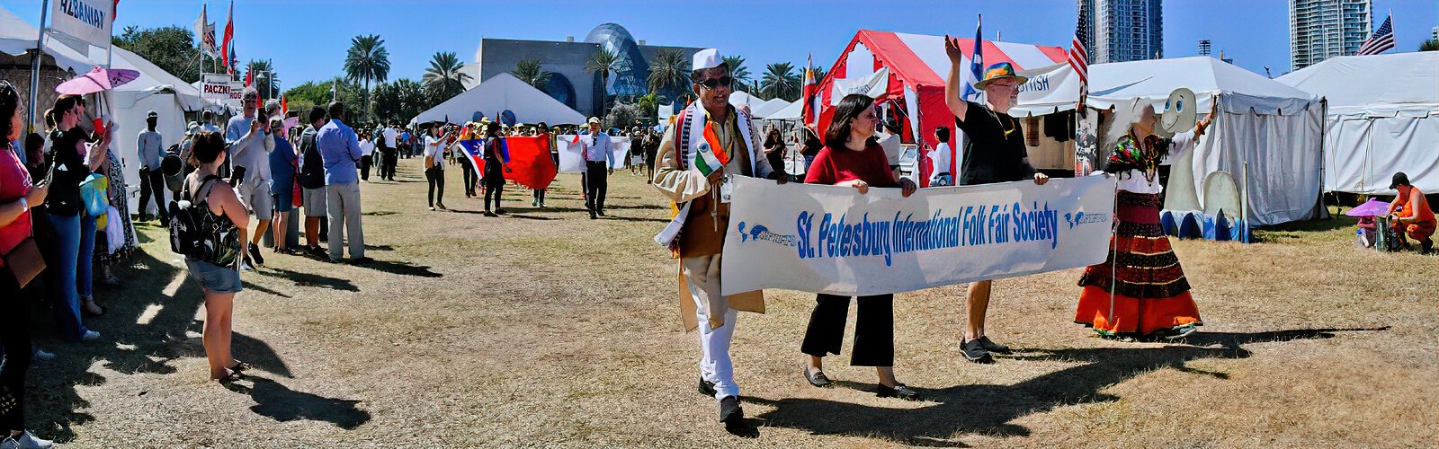 Members of the Board of Directors of SPIFFS (St Petersburg International Folk Fair Society) take part in the Parade of Nations. After a hiatus of two years due to the pandemic, the fair is back in St Petersburg.