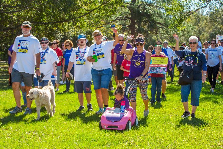 The Buddy Walk event culminates with a walk around the park.