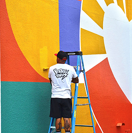 Vitale Bros. painted the mural "Rise and Shine" on the wall of Parc Center for Disabilities as a Bright S[ot Community Project during the SHINE Mural Festival.