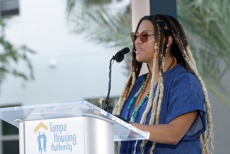 Artist Ya La'ford speaks during a dedication ceremony for her installation "Boulevard Flow" in Tampa's West River community.