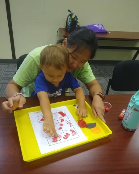 At the Family Resource Centers, parents and caregivers participate in early learning programs such as Fun with Phonics to learn techniques they can bring home.