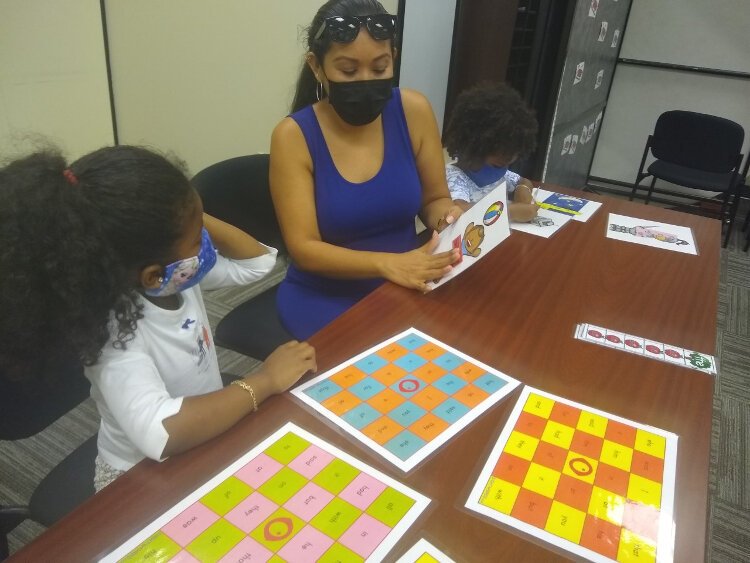 Following CDC guildelines, Children's Board of Hillsborough County Family Resource Centers remained open during COVID to serve the community, including through educational programs such as Sighting Sight Words. 