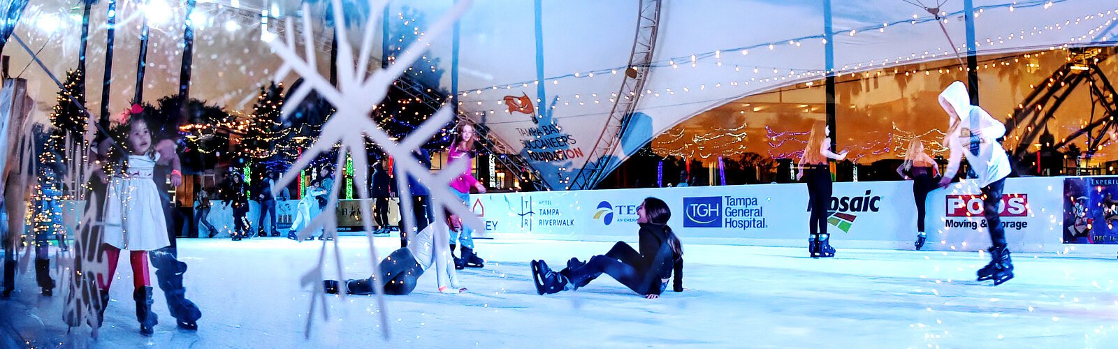  A novice skater's fall on the Winter Village ice skating rink brings out laughter.