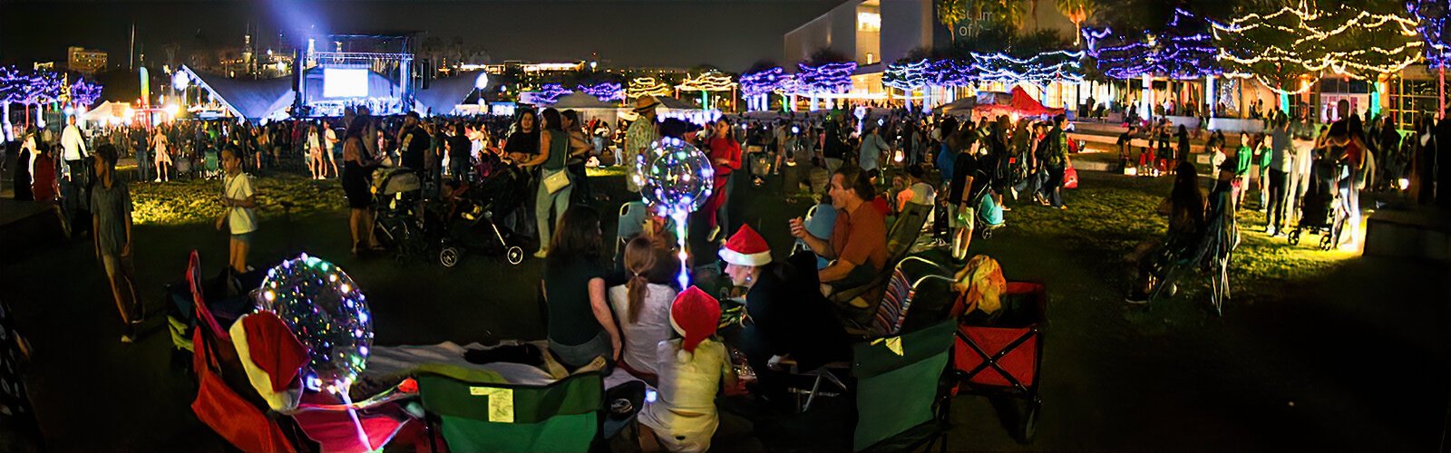  Families gather on the grounds of Curtis Hixon Waterfront Park to enjoy an evening of movies in the park.