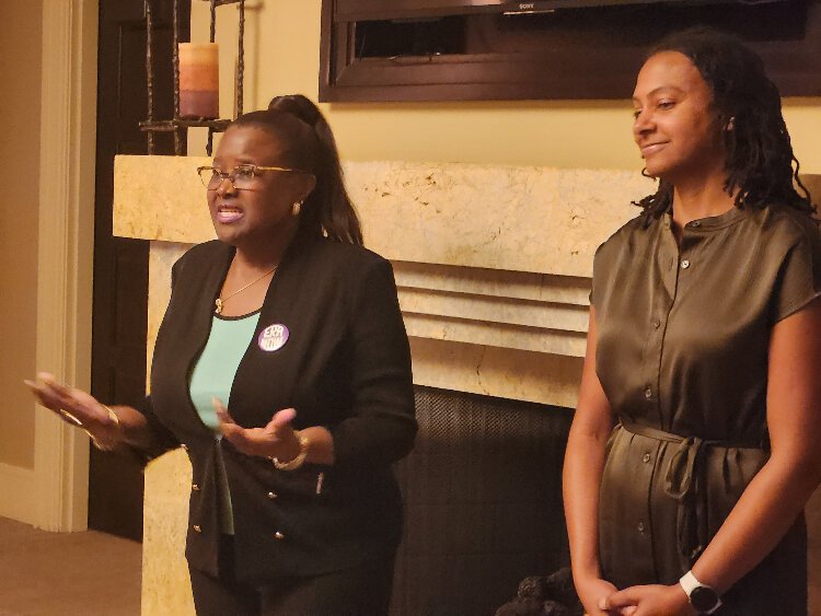 Athena Society President Denise Jordan and Zakiya Thomas, President and CEO of the ERA Coalition and Fund for Women's Equality, welcome the audience to a reception at the Westshore Yacht Club in support of the Equal Rights Amendment.