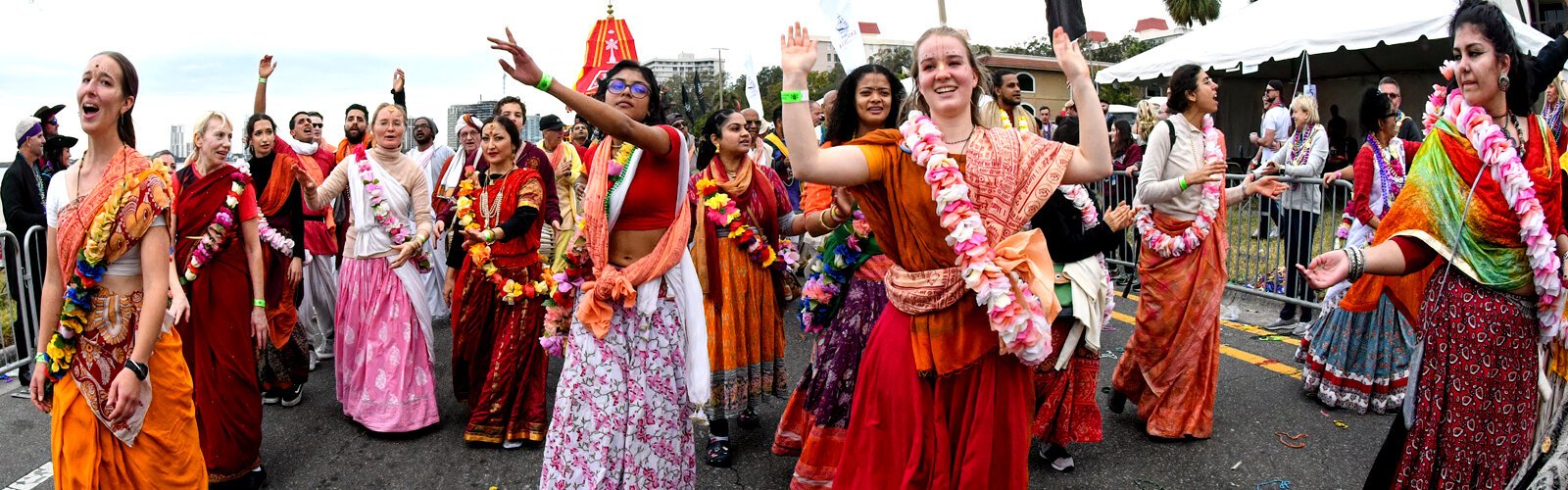 Chant, dance and be happy is the motto of the Festival of Chariots from India as they dance their way on the parade route during the 2023 Seminole Hard Rock Gasparilla Pirate Fest in Tampa.