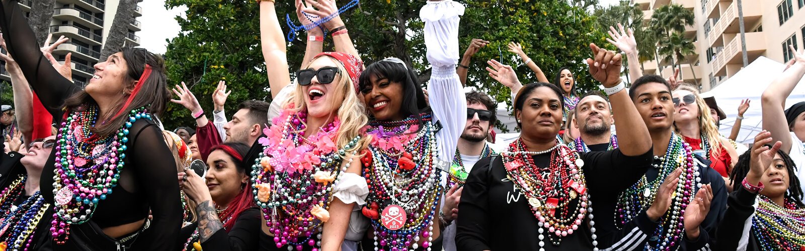 At the end of the day, parade goers proudly display their pirate's booty around their necks, still keen on grabbing more beads tossed to them.